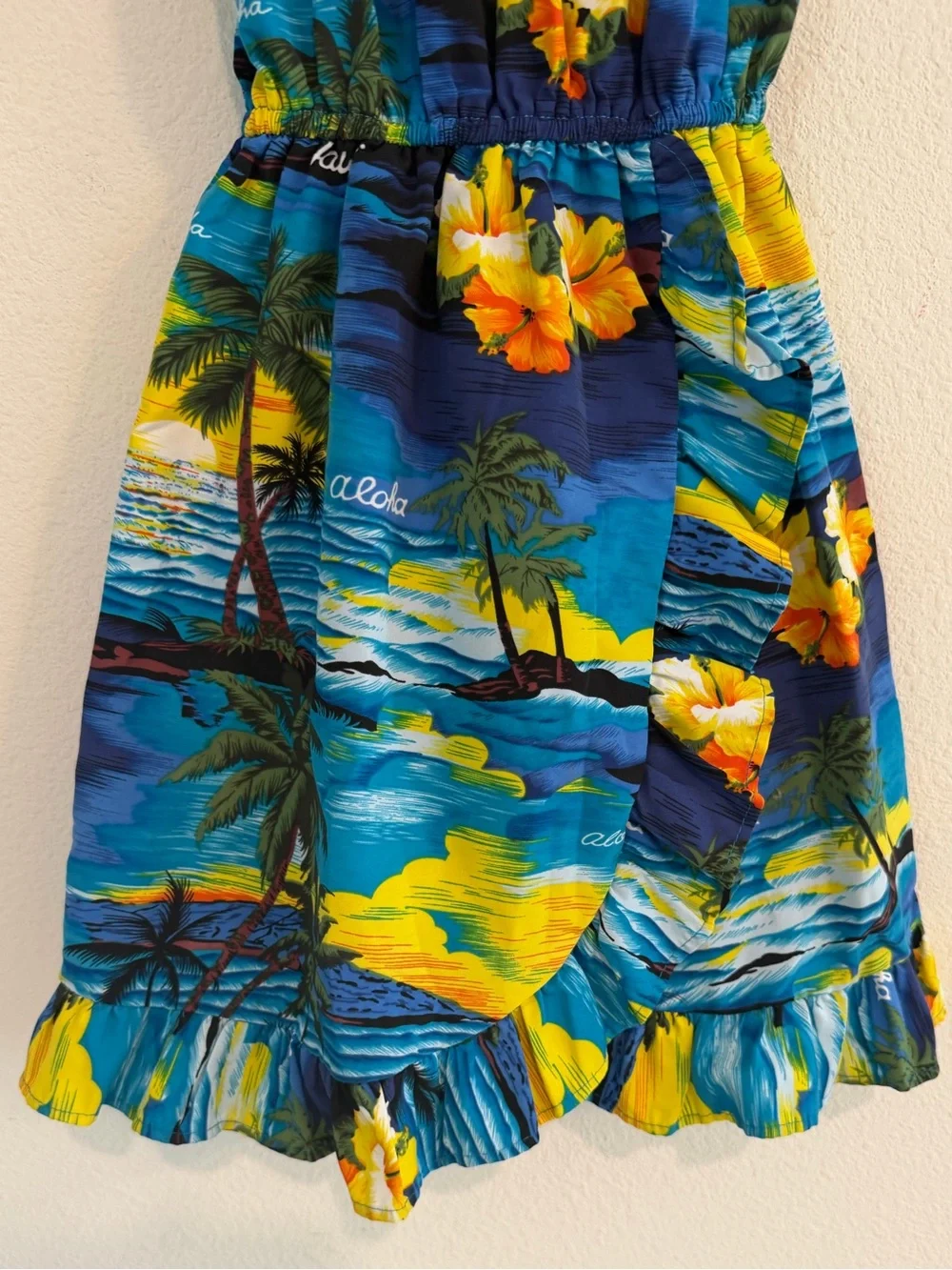 Girls Blue Tropical Ruffle Dress with Yellow Floral Accents